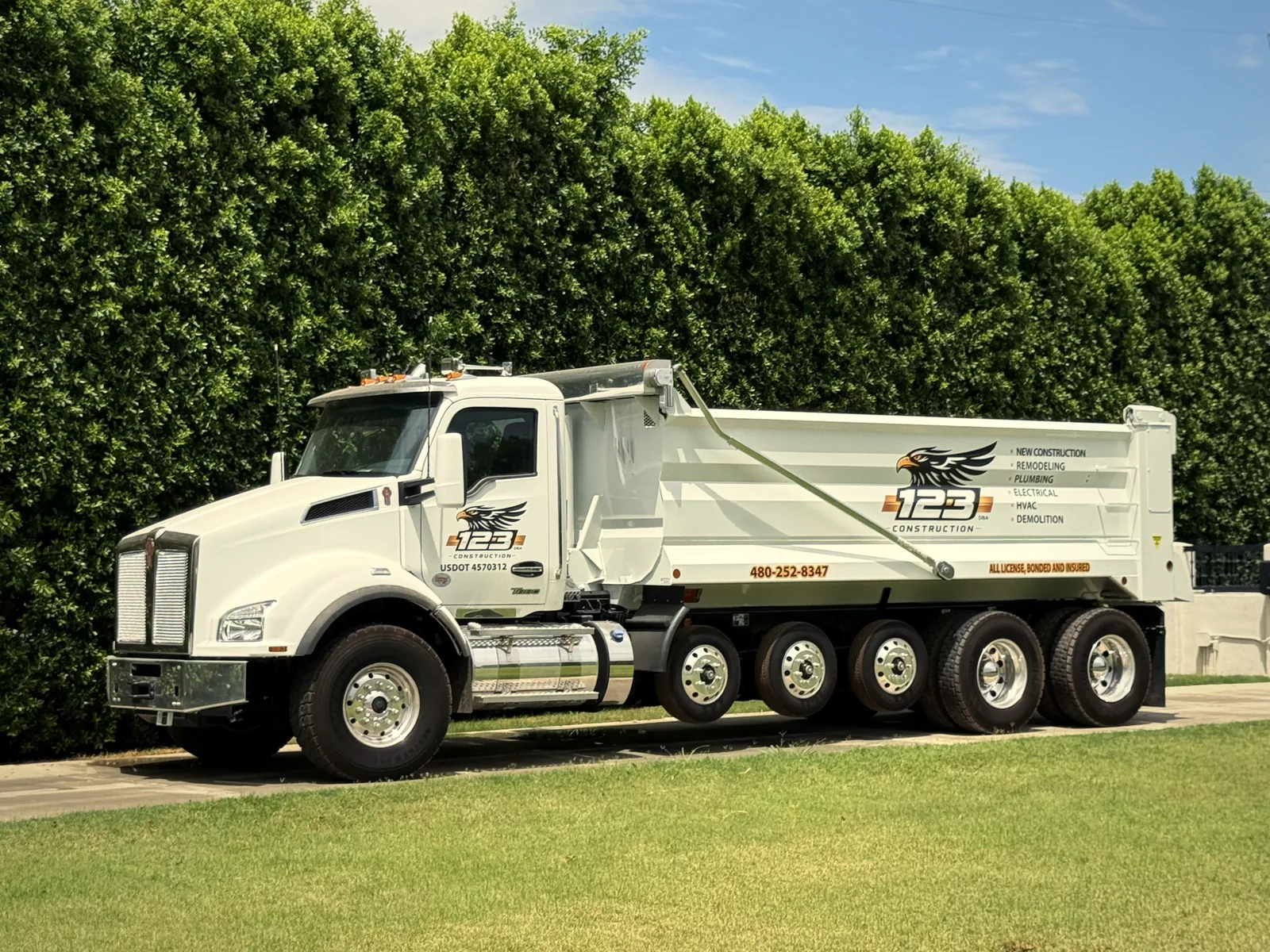 123 Construction DOT-registered dump truck, part of the in-house demolition and site work fleet in Gilbert AZ